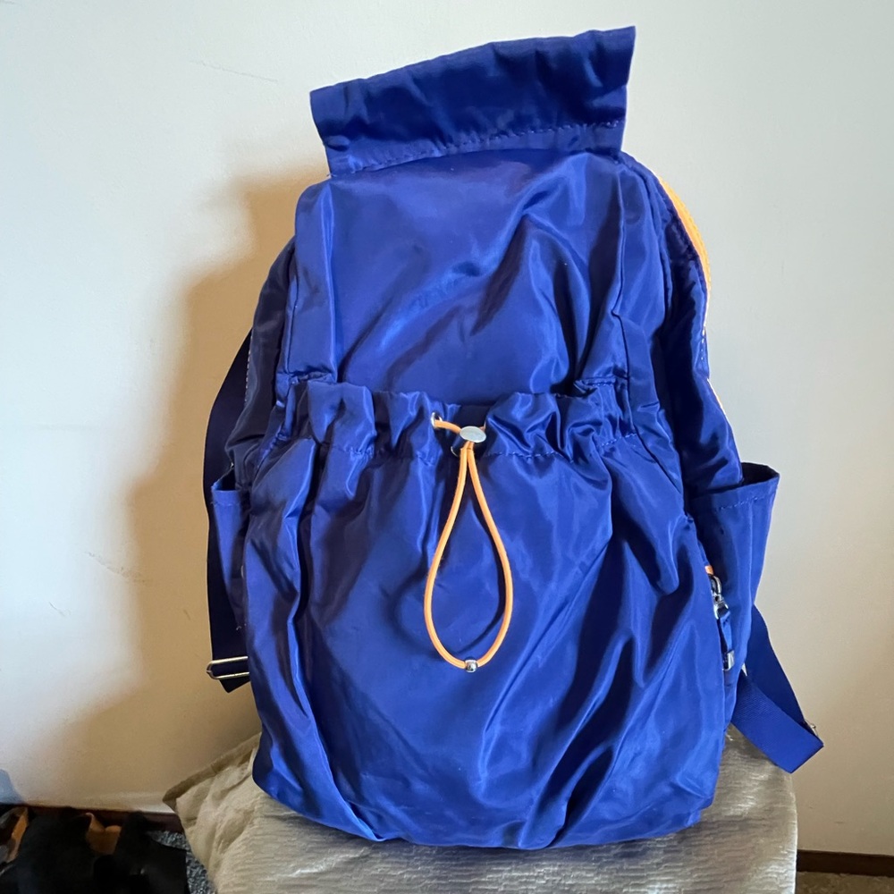 Blue Backpack with Orange Accents
Baggalinni